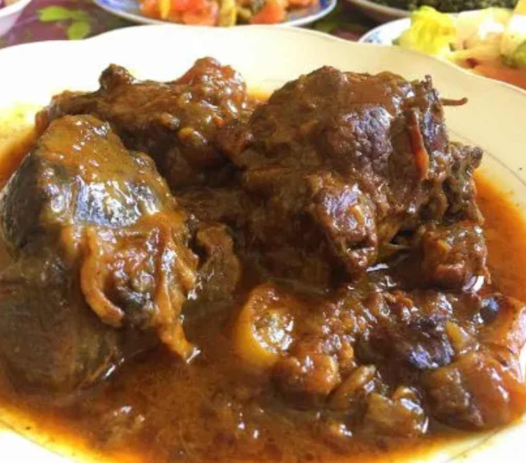 Mrouzia (Sweet and Spicy Lamb Tagine with Raisins and Almonds)